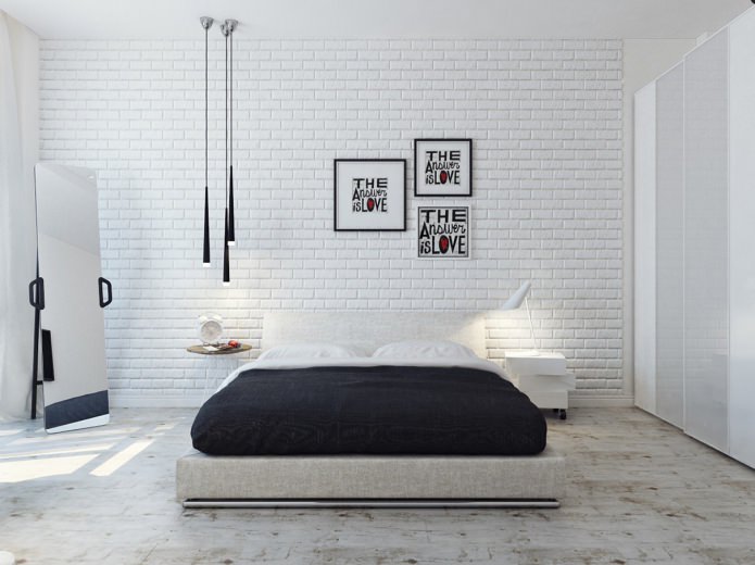 белая кирпичная стена в спальне