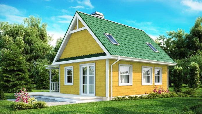 желтый загородный дом с ярко-зеленой крышей