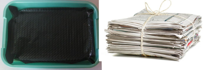 Черная сумка и газеты