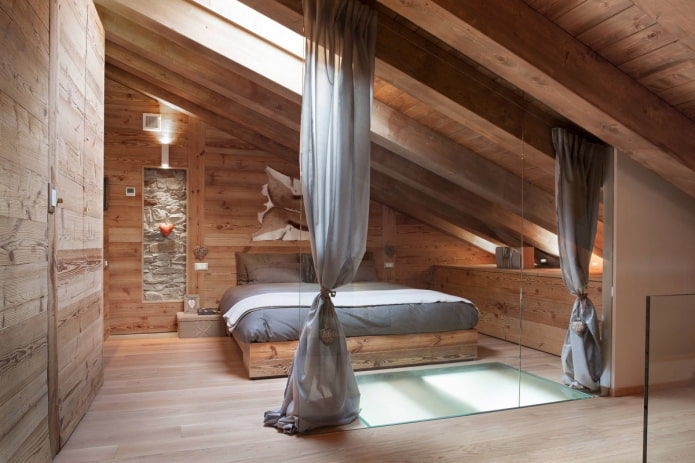 интерьер спальни в стиле лофт из необработанного дерева