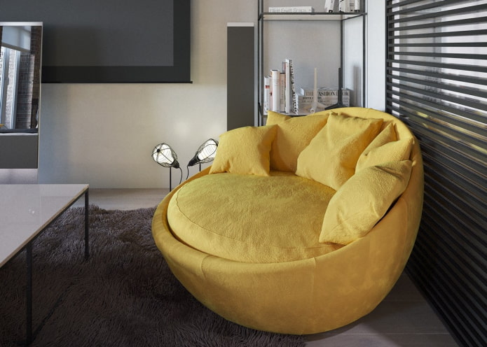 овальный желтый диван в интерьере